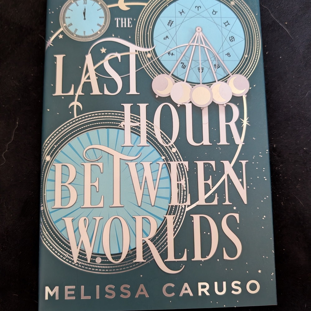 The Last Hour Between Worlds by Melissa Caruso - Blue Cover